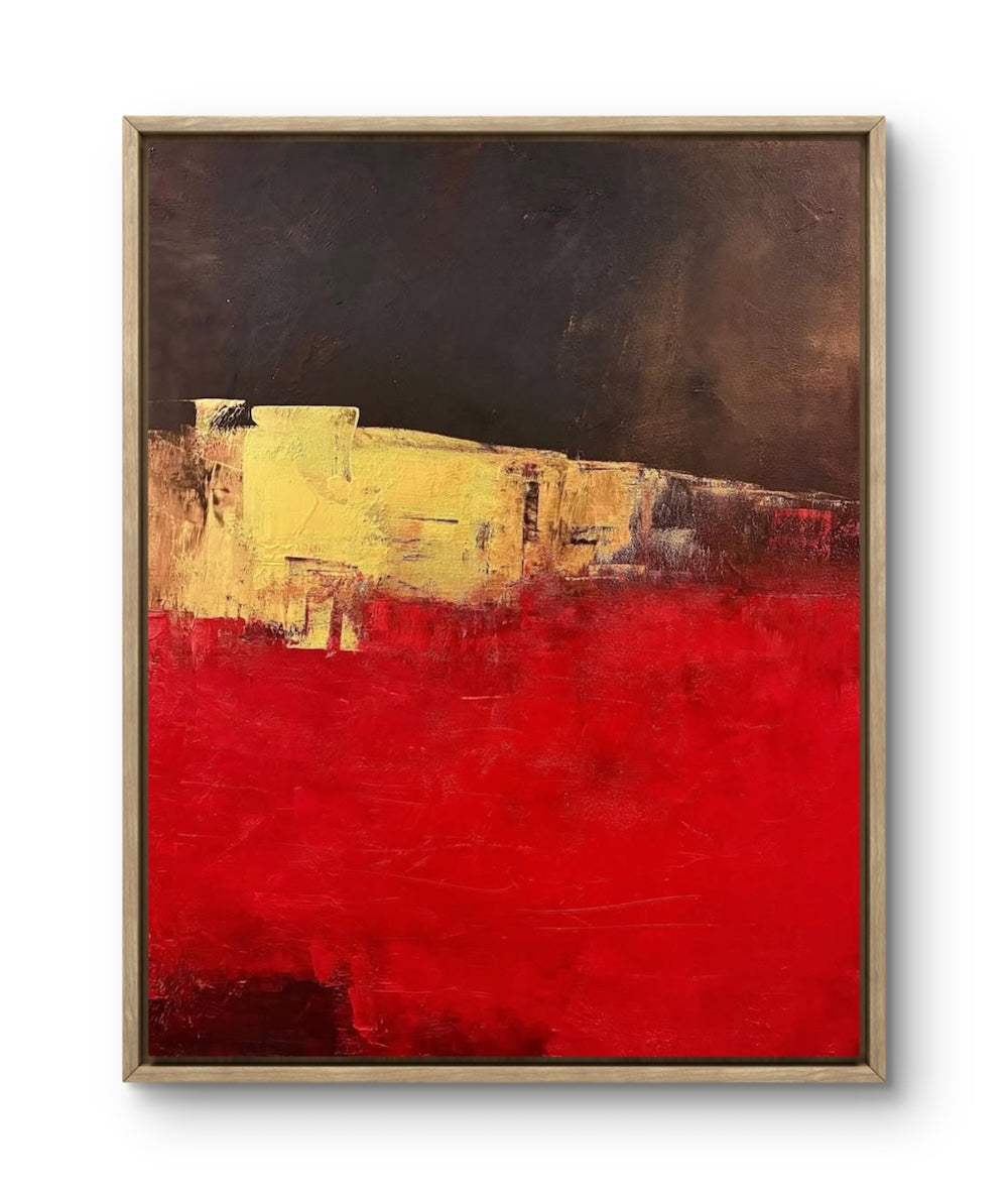 Abstract painting with red and yellow colors in a wooden frame on a white background