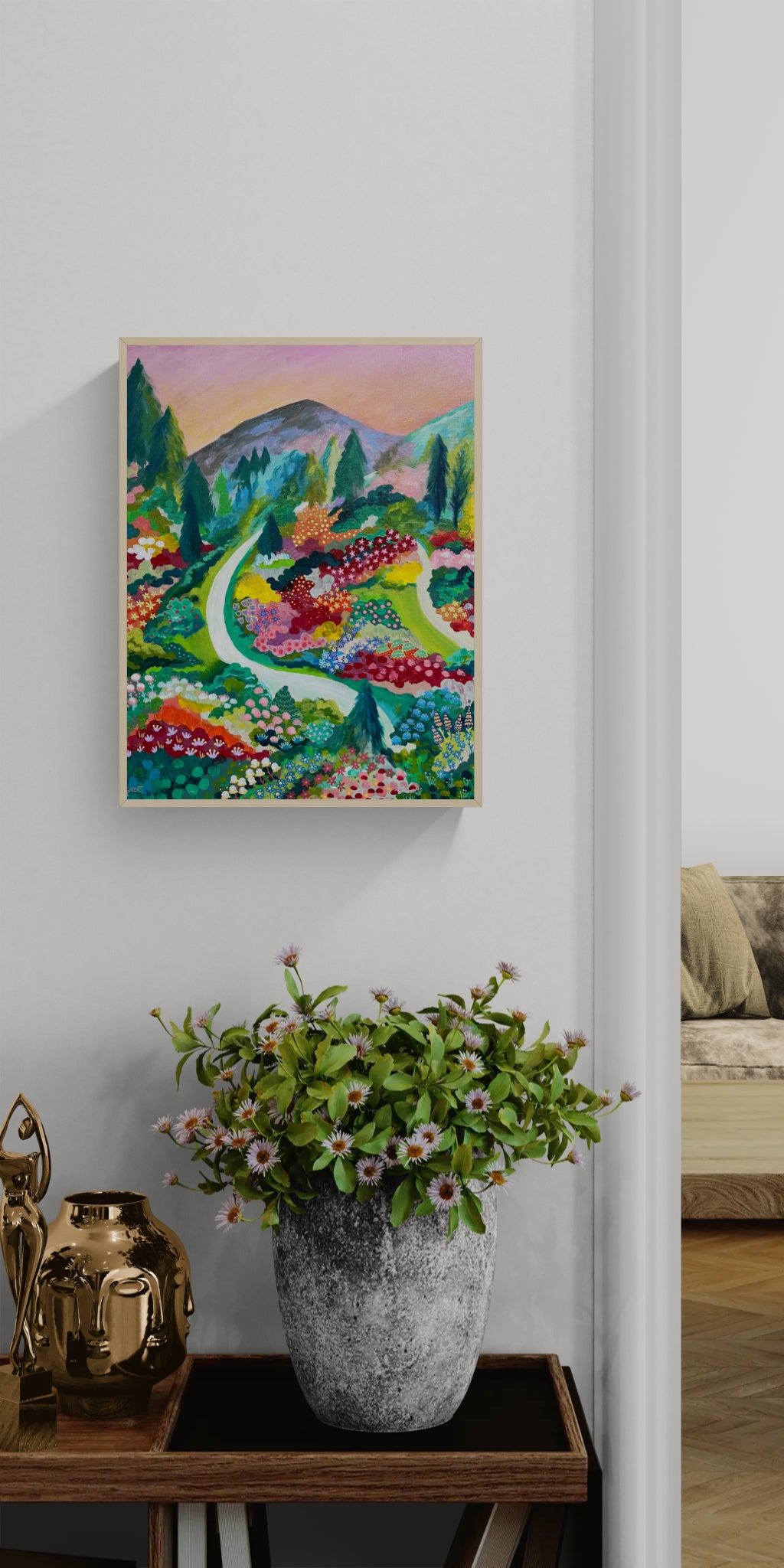 Inspired by the Butchart Gardens of British Columbia, a serene garden unfolds along a meandering path below a soft pink sky in a room.