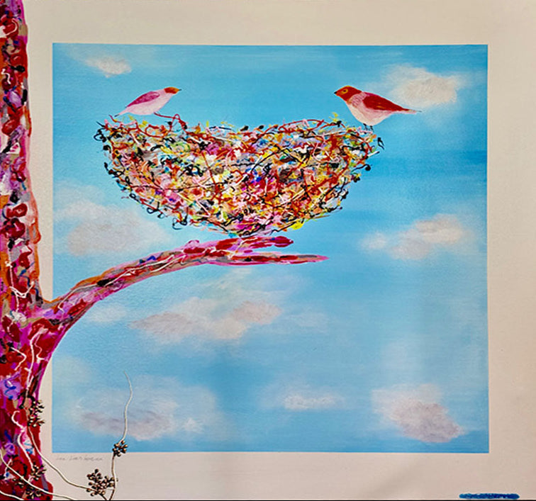 A colorful painting of a bird's nest on a tree branch against a blue sky with clouds, featuring two small birds, shown mounted on a beige wall.
