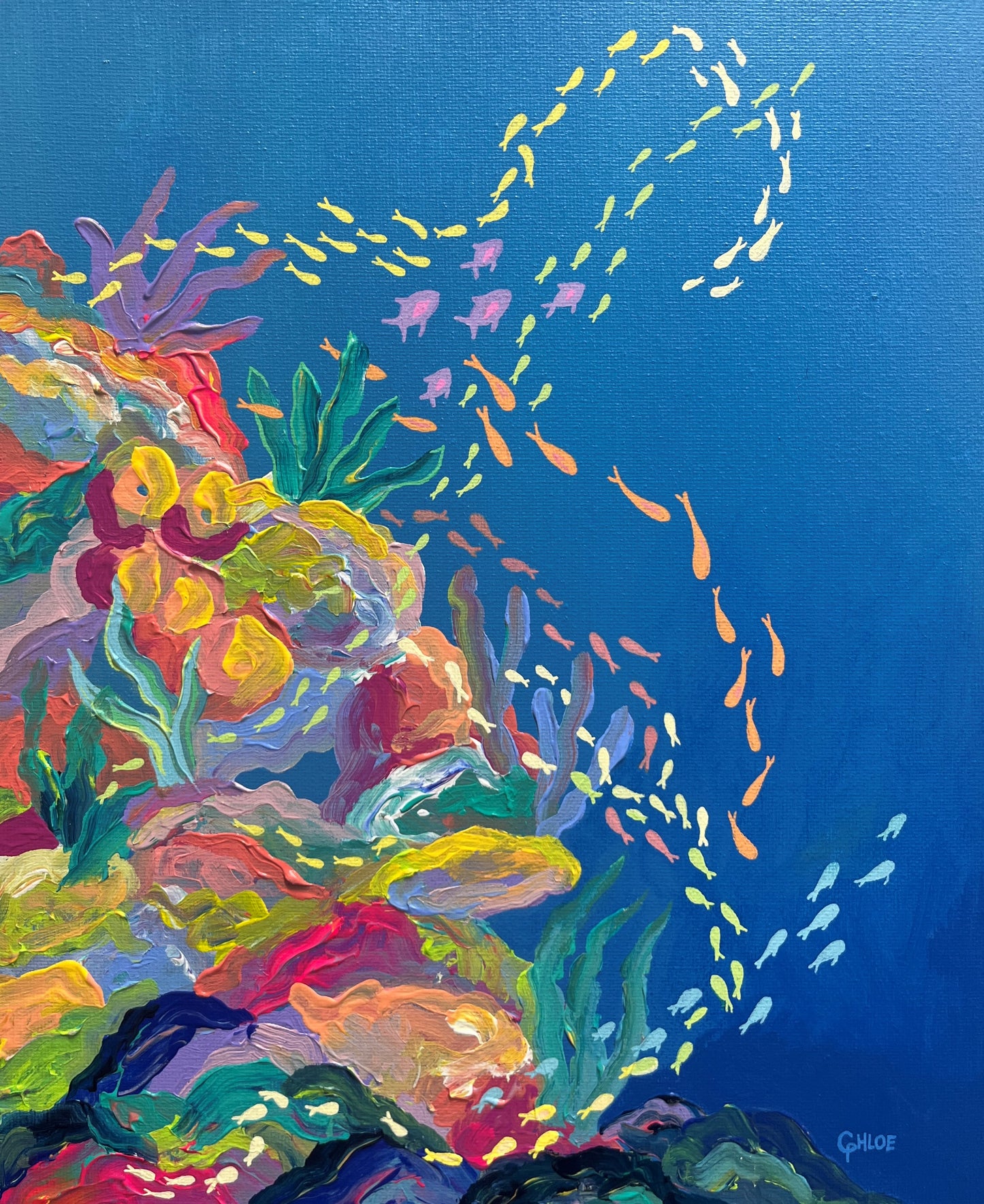 Colorful underwater scene with coral and fish on a blue background