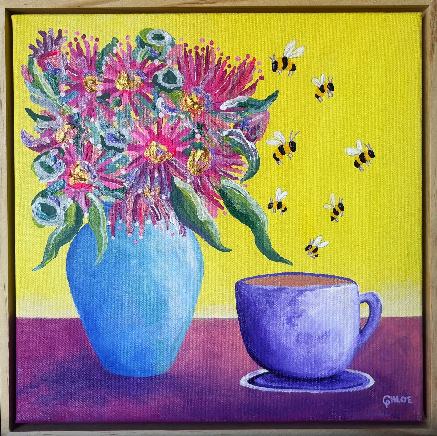 Colorful painting of flowers in a blue vase and a purple cup on a yellow background with bees.