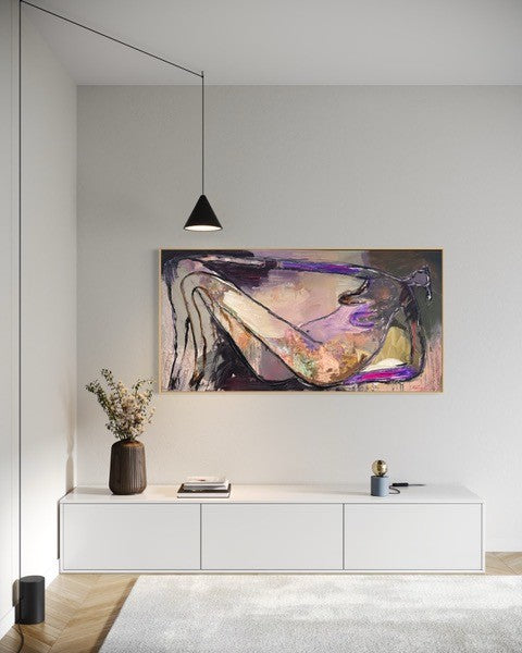 Modern interior with abstract painting on a wall, white cabinet, and decorative items.