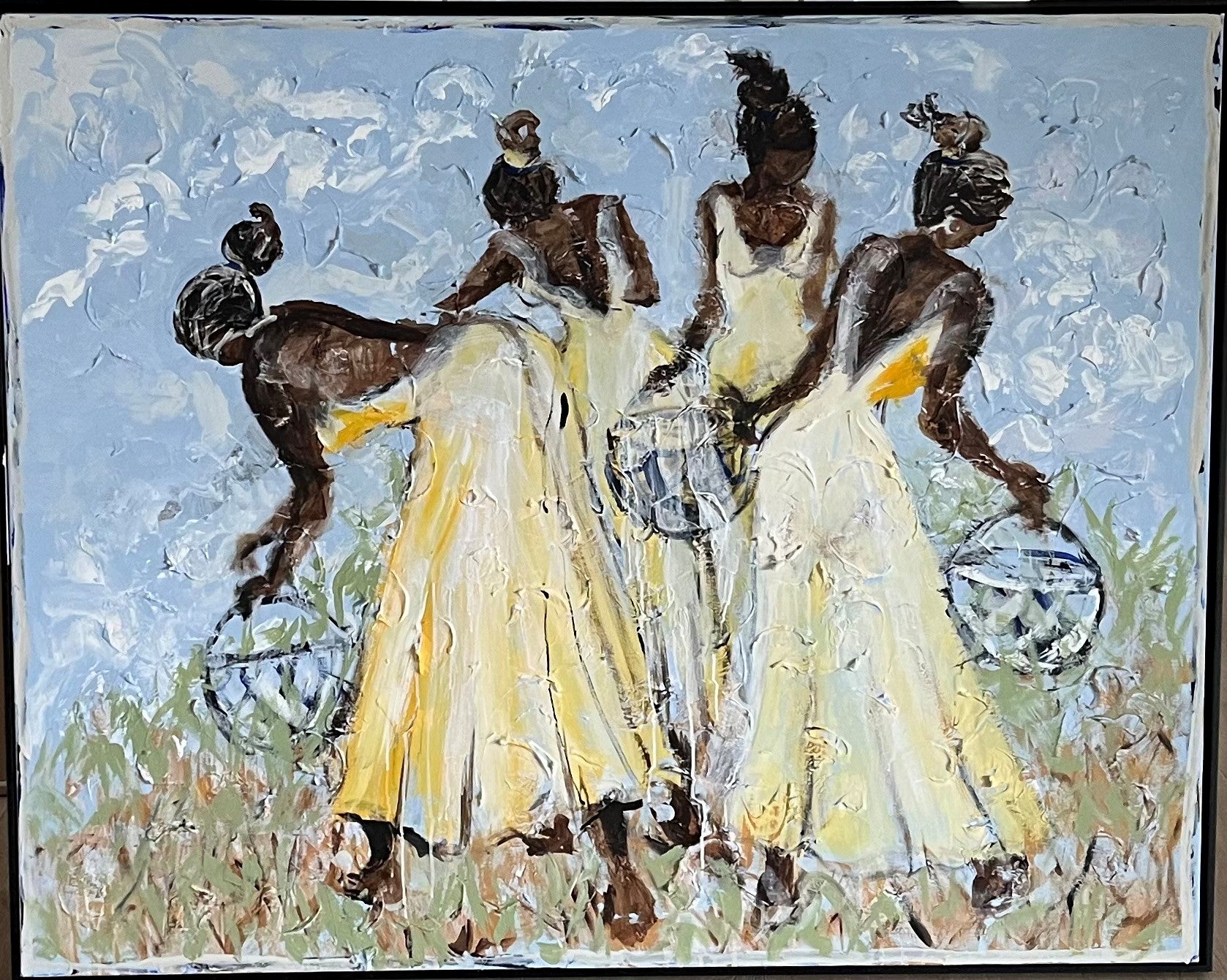 Abstract painting of three figures in yellow dresses with a blue sky and green grass background.