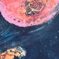 Artistic depiction of a space scene with a large pink planet and rocky landscape.