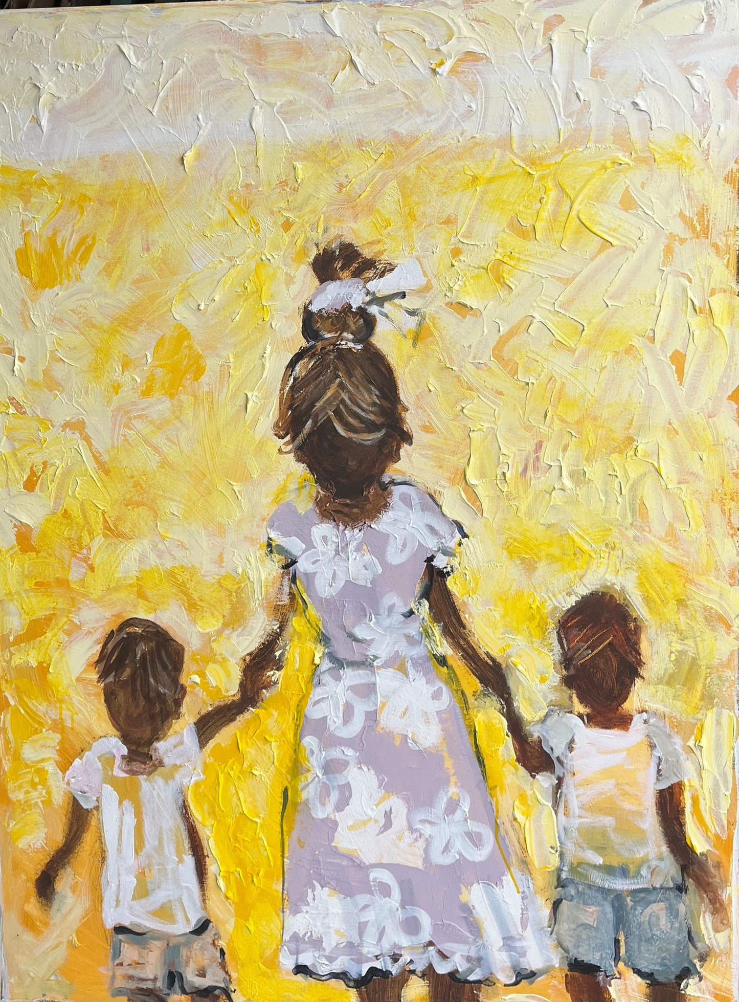 Painting of a woman and two children walking together against a yellow background