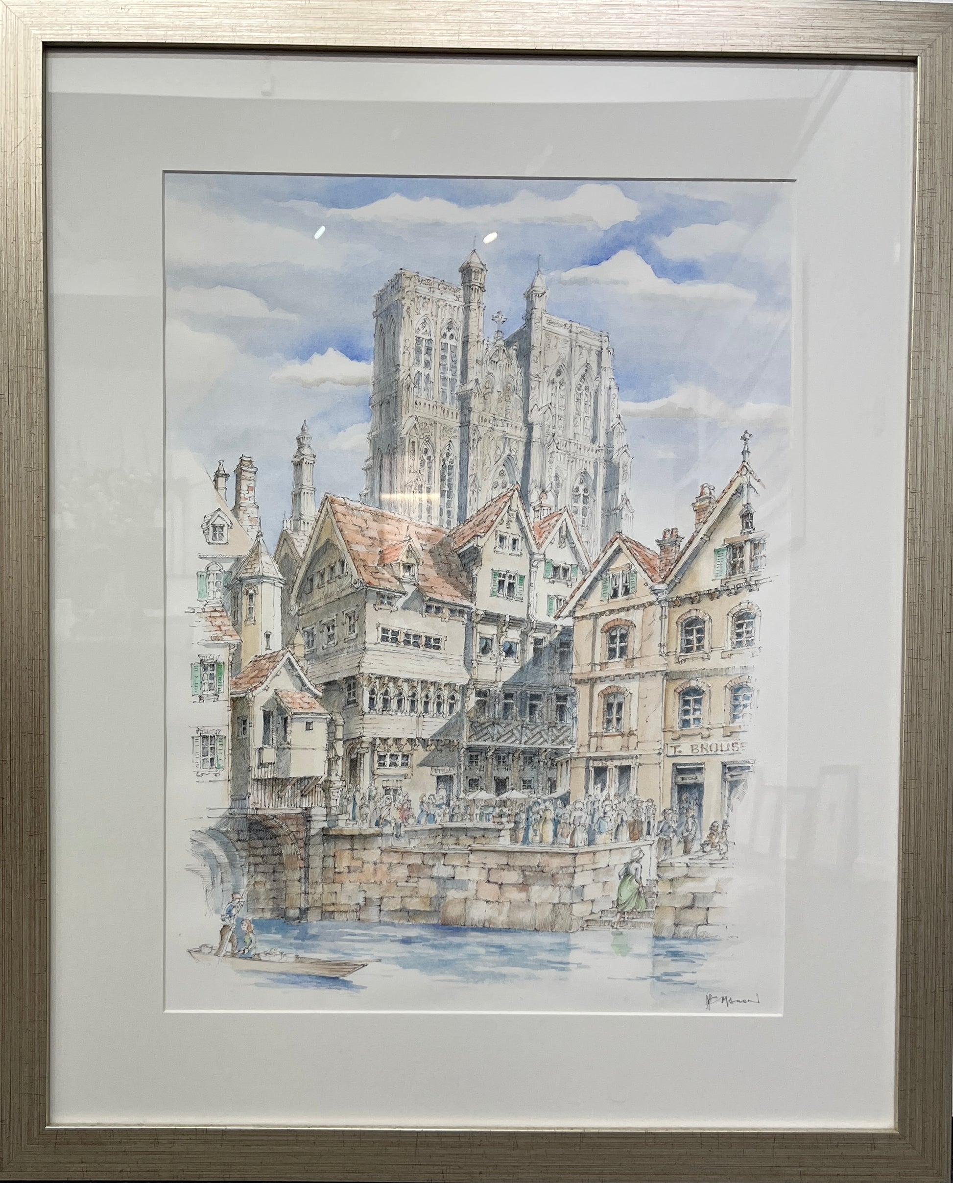 Framed watercolor painting of a cityscape with a prominent cathedral.