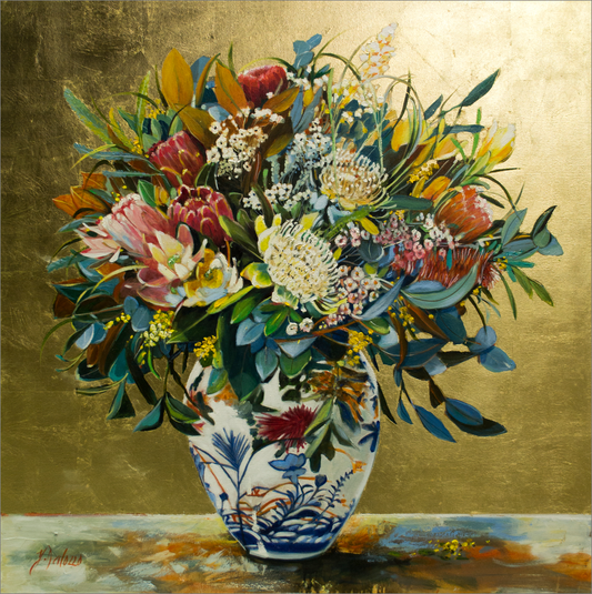 Floral arrangement in a decorative vase on a gold background